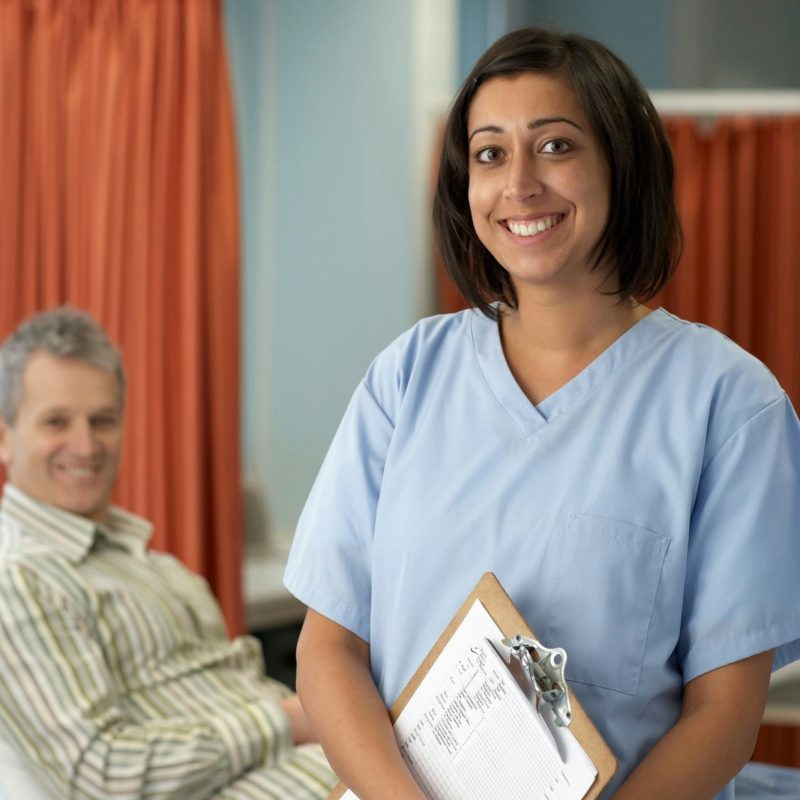 smiling-nurse-patient-behind.jpg smiling-nurse-patient-behind.jpg